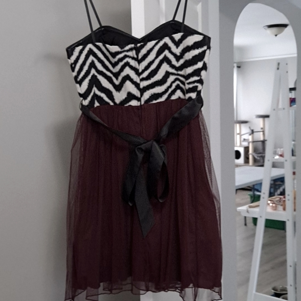 Strapless zebra print dress with plum colored bottom